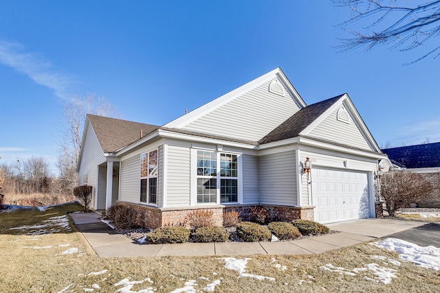 view of side of property with a garage