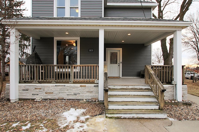 entrance to property with a porch