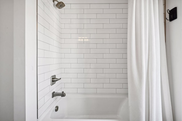 bathroom featuring shower / tub combo with curtain