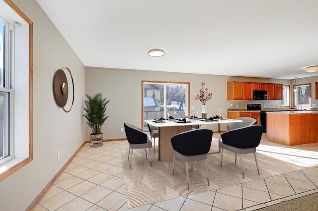 tiled dining space with plenty of natural light