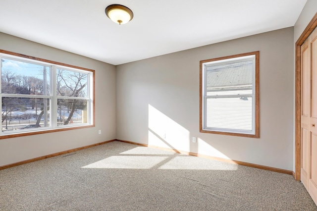 view of carpeted spare room