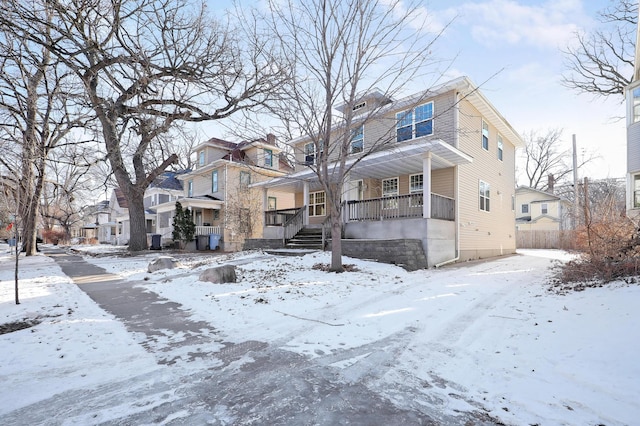 view of property featuring a porch