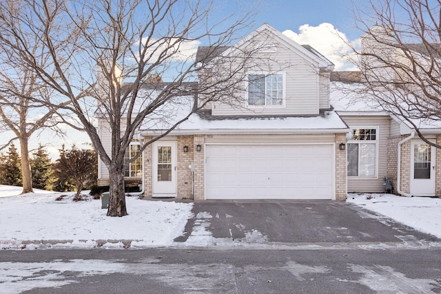 front of property with a garage