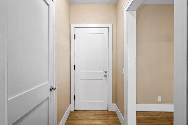 hallway featuring light hardwood / wood-style floors