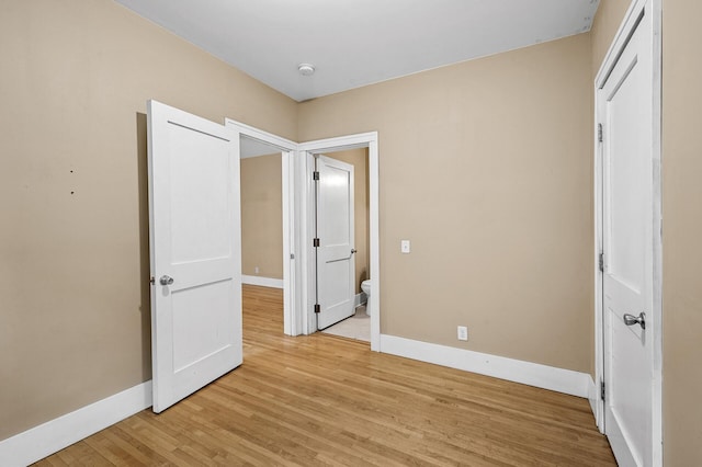 unfurnished bedroom featuring light hardwood / wood-style floors