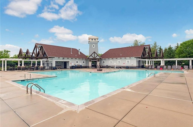 view of pool featuring a patio area