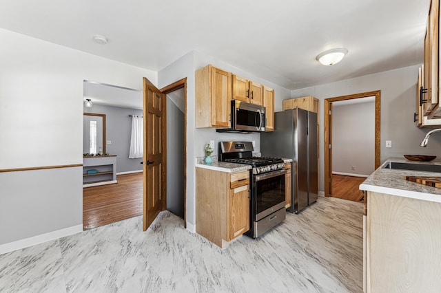 kitchen with sink and stainless steel appliances