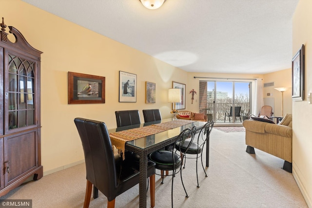 view of carpeted dining room