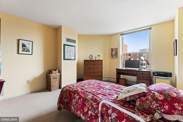 carpeted bedroom featuring a textured ceiling and baseboard heating