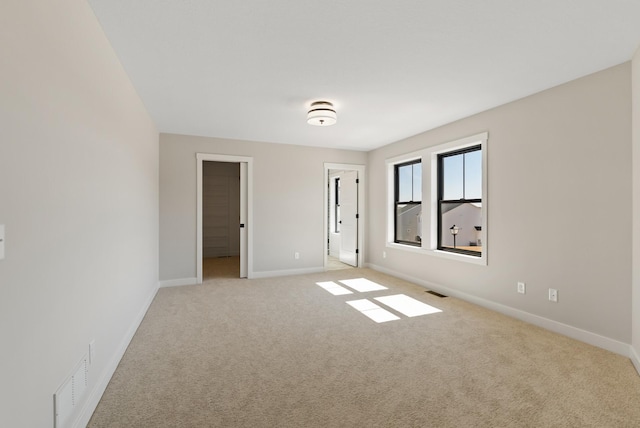 18436 56th Ct N, Plymouth, MN 55446 - spare room with light carpet and baseboards