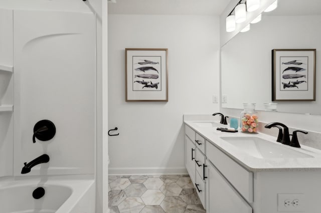 bathroom with shower / bathtub combination and vanity