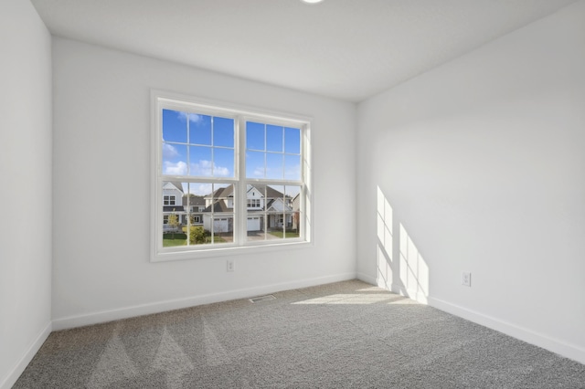 view of carpeted spare room