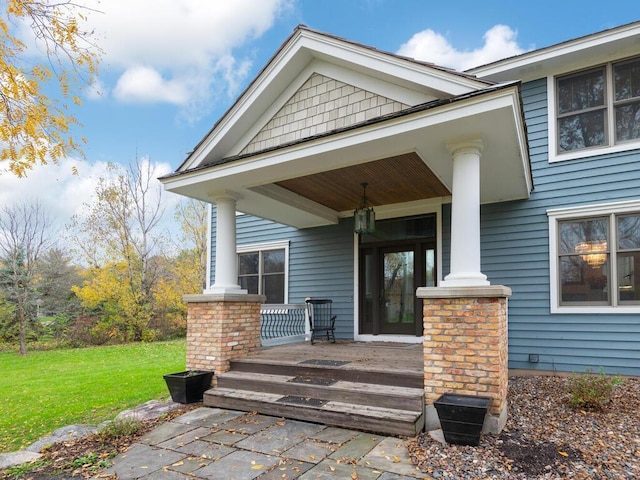 doorway to property with a porch