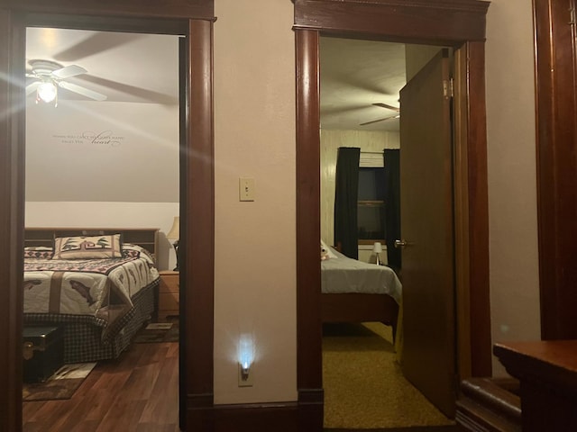 corridor featuring dark hardwood / wood-style flooring