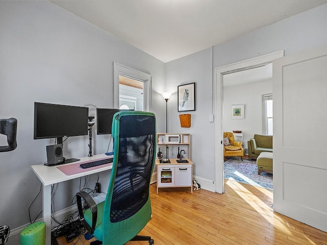 home office featuring light hardwood / wood-style floors