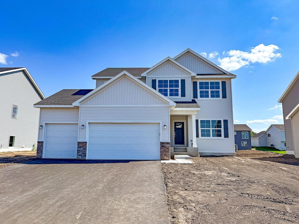 craftsman-style home featuring a garage