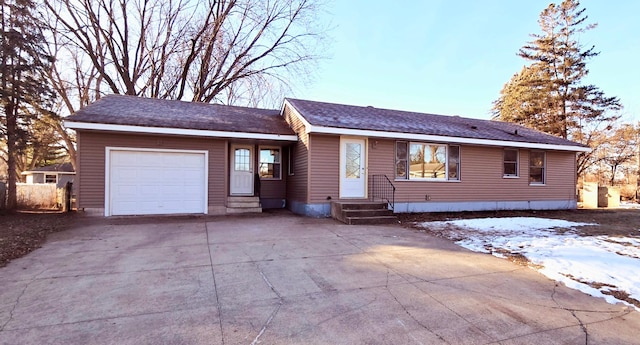 single story home featuring a garage