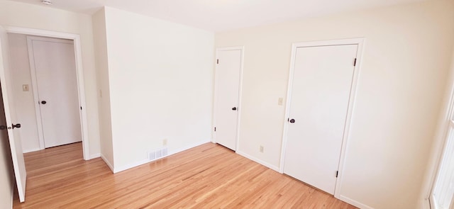 unfurnished bedroom featuring light hardwood / wood-style flooring