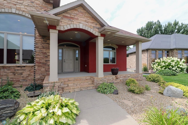 property entrance featuring covered porch