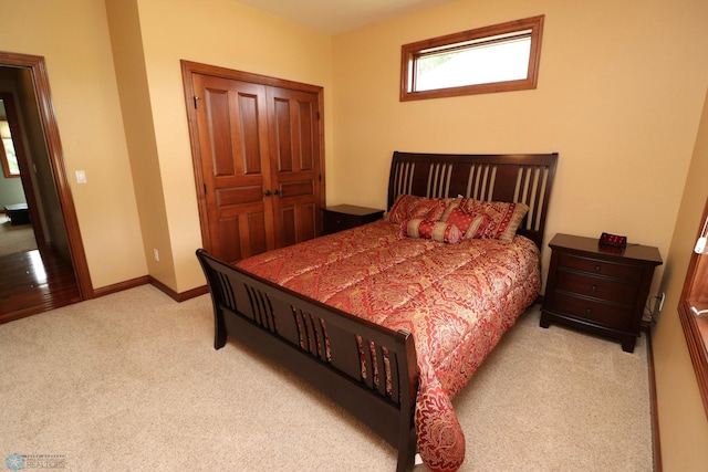 bedroom with light colored carpet