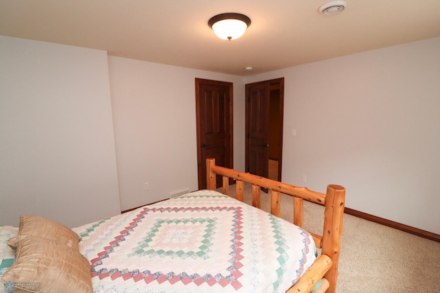 bedroom featuring carpet