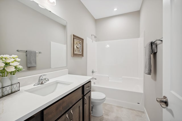 full bathroom with shower / tub combination, vanity, and toilet