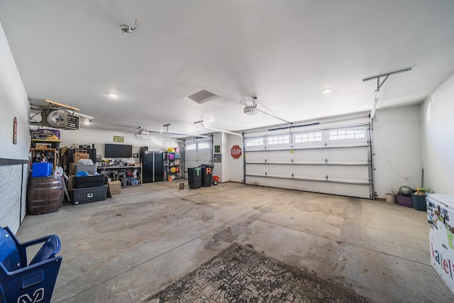 garage featuring a garage door opener