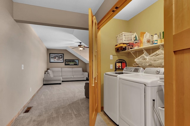 laundry room with separate washer and dryer, light carpet, and ceiling fan