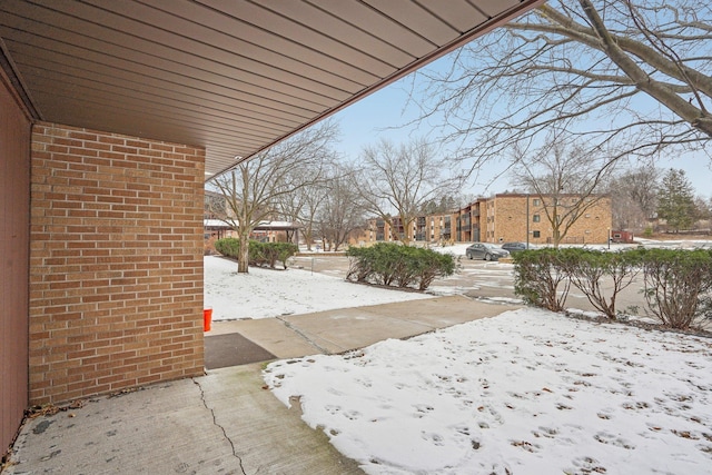 view of yard covered in snow