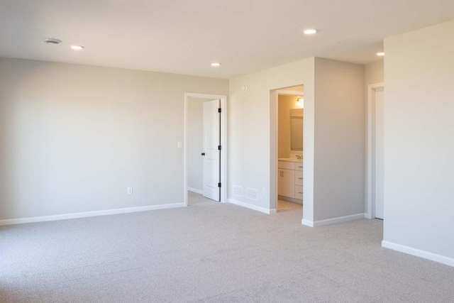 14554 Kingsview Ln N, Dayton, MN 55327 - unfurnished bedroom with light carpet, recessed lighting, baseboards, and ensuite bath