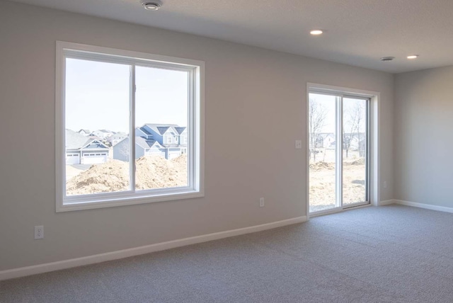 14554 Kingsview Ln N, Dayton, MN 55327 - unfurnished room with carpet floors, baseboards, and recessed lighting