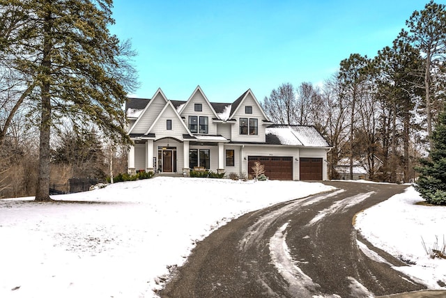 view of front of property with a garage