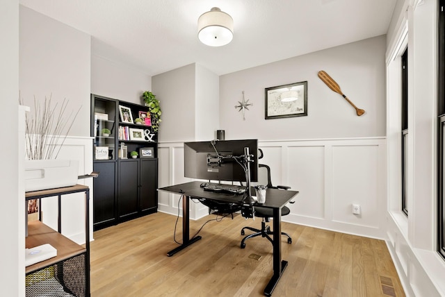 office space featuring light wood-type flooring