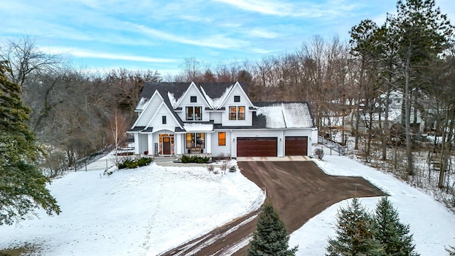 view of front of property featuring a garage