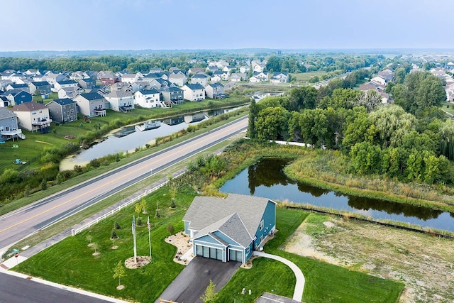 bird's eye view with a water view