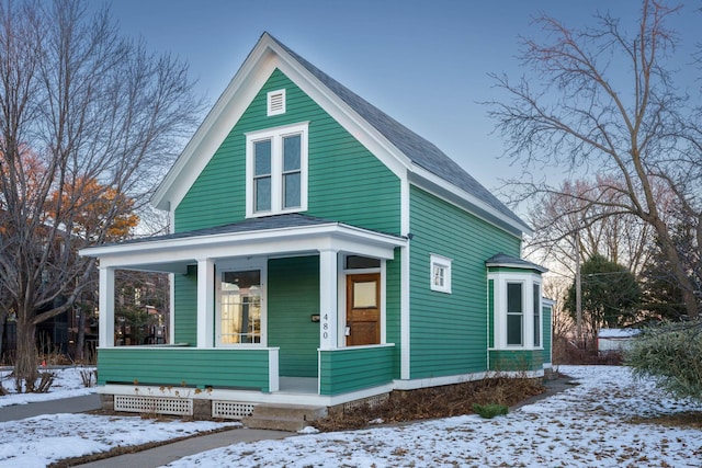 view of front of property featuring covered porch