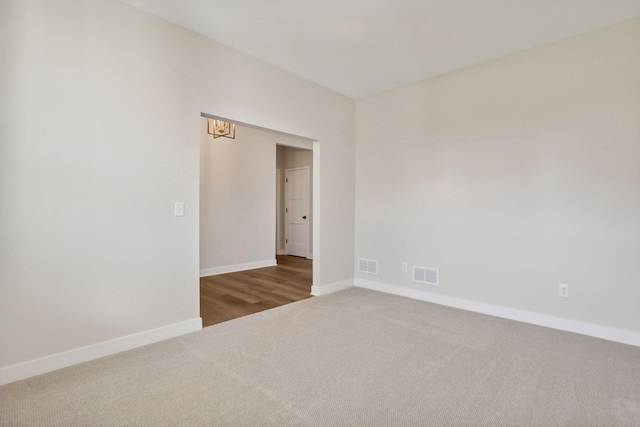 empty room with carpet flooring