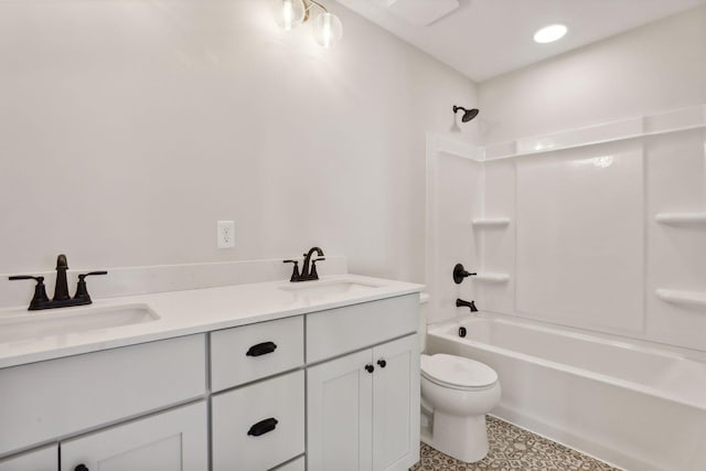 full bathroom with washtub / shower combination, vanity, and toilet