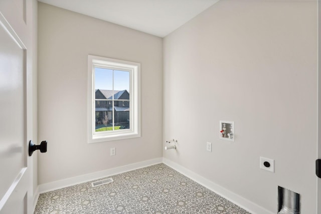 washroom featuring washer hookup and electric dryer hookup