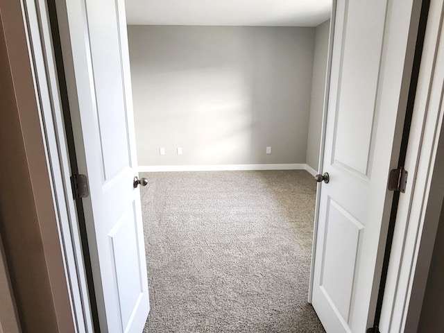 spare room featuring carpet