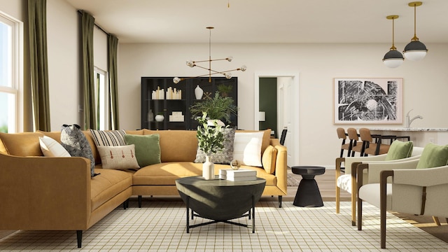 living area featuring light wood-type flooring and a notable chandelier