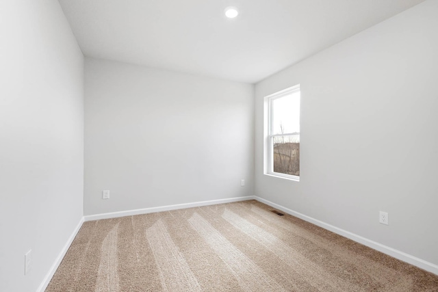 18721 Grant St NW, Elk River, MN 55330 - carpeted spare room with baseboards and recessed lighting