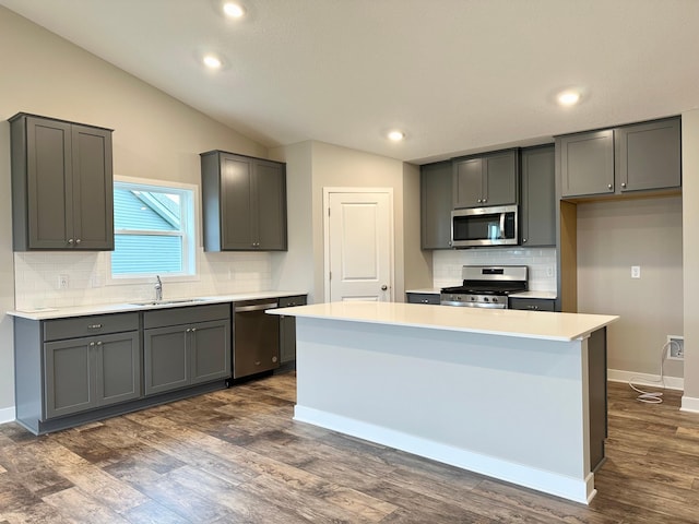 kitchen featuring gray cabinetry, sink, and stainless steel appliances