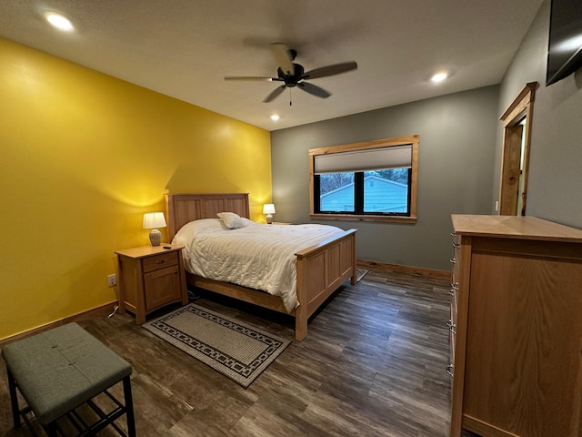 bedroom featuring dark hardwood / wood-style floors and ceiling fan