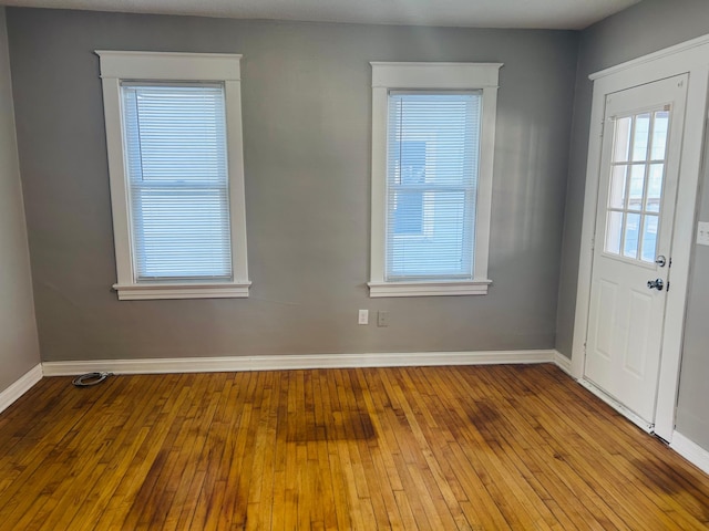 doorway with light hardwood / wood-style floors