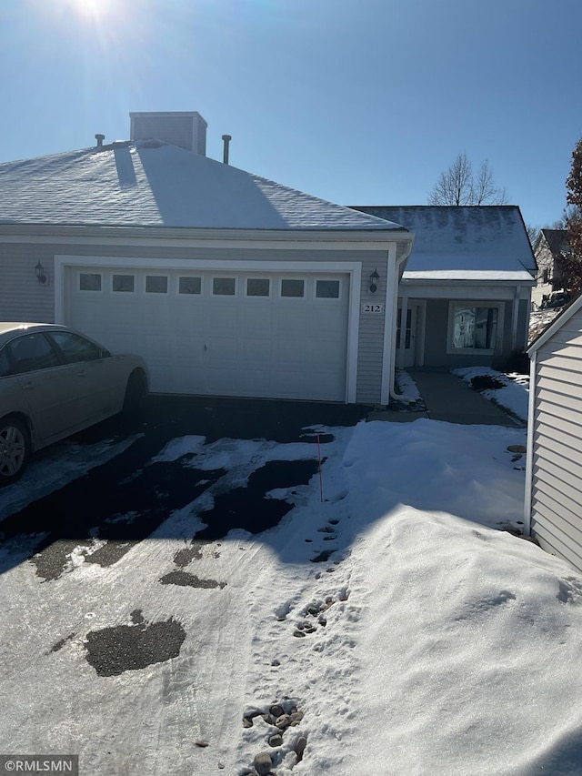 view of front of home featuring a garage