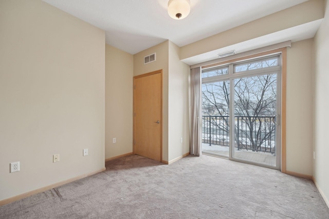 unfurnished bedroom featuring light carpet, baseboards, visible vents, and access to exterior