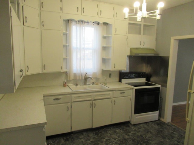 kitchen featuring sink, range with electric cooktop, white cabinets, and a chandelier