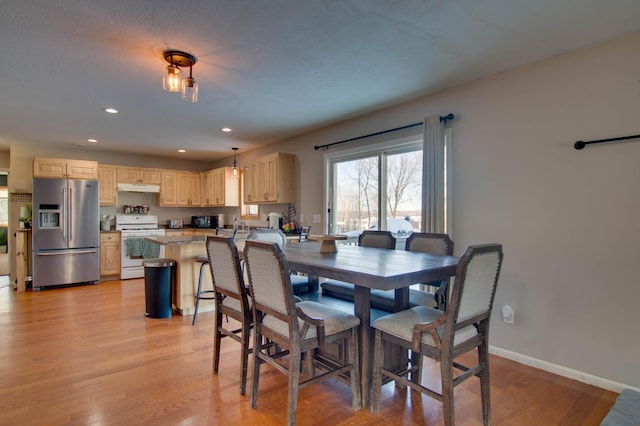 dining room featuring light hardwood / wood-style flooring