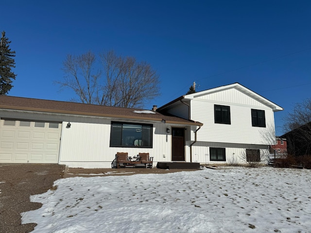 tri-level home featuring a garage